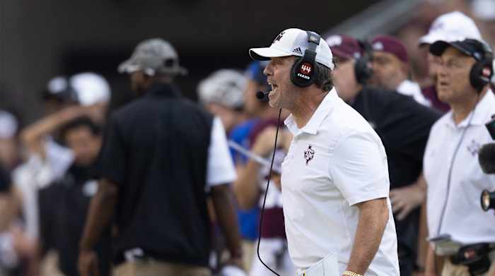 Sep 10, 2022; College Station, Texas, USA; Texas A&M Aggies head coach Jimbo Fisher yells as they play against the Appalachian State Mountaineers in the fourth quarter at Kyle Field. Appalachian State Mountaineers won 17 to 14.